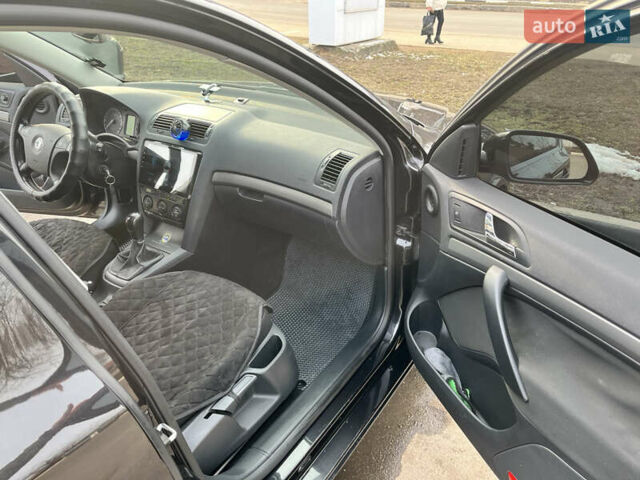 Черный Шкода Октавия, объемом двигателя 1.6 л и пробегом 216 тыс. км за 7600 $, фото 8 на Automoto.ua