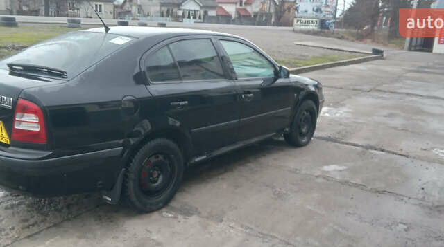 Черный Шкода Октавия, объемом двигателя 1.6 л и пробегом 250 тыс. км за 5700 $, фото 5 на Automoto.ua