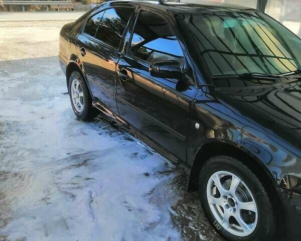 Черный Шкода Октавия, объемом двигателя 1.9 л и пробегом 243 тыс. км за 4000 $, фото 5 на Automoto.ua