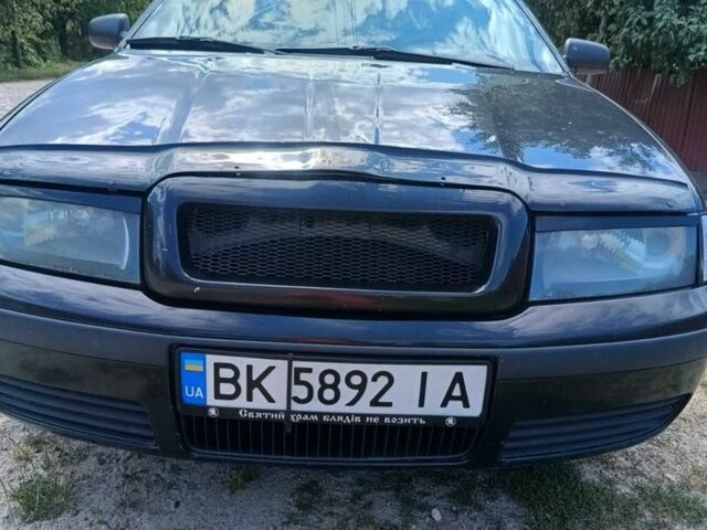 Черный Шкода Октавия, объемом двигателя 1.8 л и пробегом 290 тыс. км за 4500 $, фото 3 на Automoto.ua