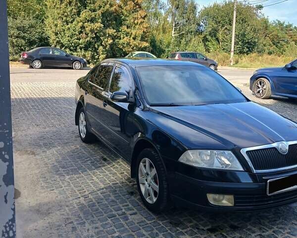 Черный Шкода Октавия, объемом двигателя 1.6 л и пробегом 285 тыс. км за 5700 $, фото 1 на Automoto.ua