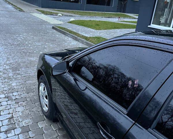 Черный Шкода Октавия, объемом двигателя 1.6 л и пробегом 245 тыс. км за 5400 $, фото 12 на Automoto.ua