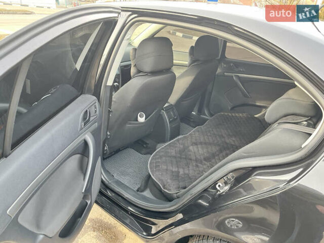 Черный Шкода Октавия, объемом двигателя 1.6 л и пробегом 216 тыс. км за 7600 $, фото 10 на Automoto.ua