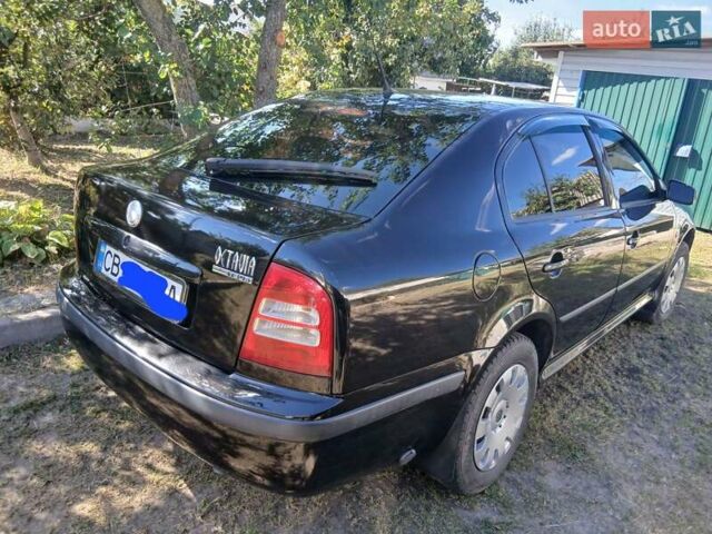 Черный Шкода Октавия, объемом двигателя 1.6 л и пробегом 183 тыс. км за 6000 $, фото 2 на Automoto.ua