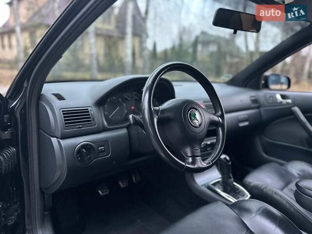 Черный Шкода Октавия, объемом двигателя 1.8 л и пробегом 164 тыс. км за 7500 $, фото 11 на Automoto.ua