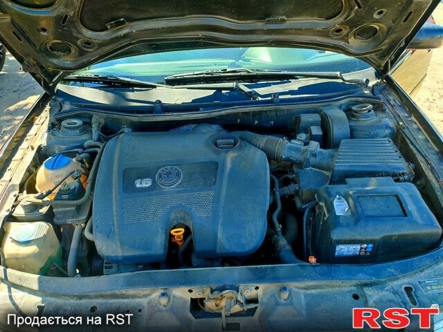 Черный Шкода Октавия, объемом двигателя 1.6 л и пробегом 225 тыс. км за 5900 $, фото 1 на Automoto.ua