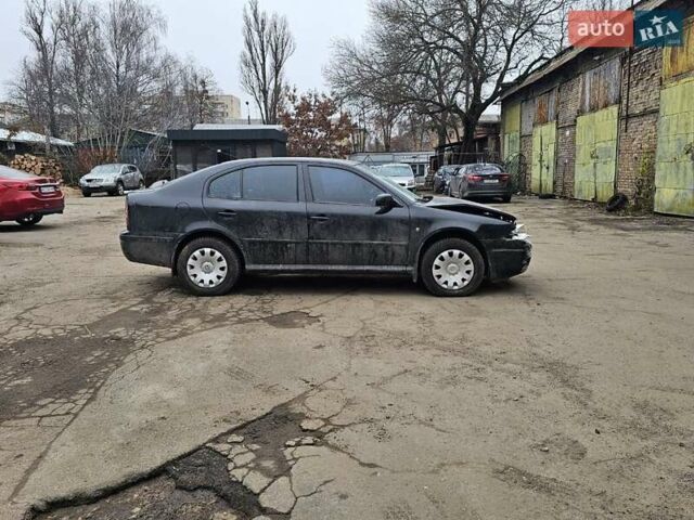 Черный Шкода Октавия, объемом двигателя 1.6 л и пробегом 210 тыс. км за 2350 $, фото 3 на Automoto.ua