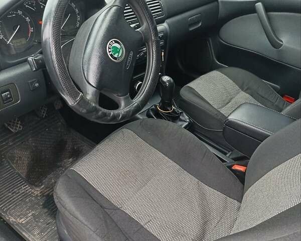 Чорний Шкода Октавія, об'ємом двигуна 1.6 л та пробігом 223 тис. км за 7000 $, фото 1 на Automoto.ua