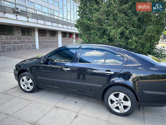 Черный Шкода Октавия, объемом двигателя 2 л и пробегом 172 тыс. км за 6700 $, фото 1 на Automoto.ua