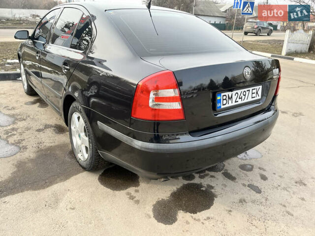 Черный Шкода Октавия, объемом двигателя 1.6 л и пробегом 216 тыс. км за 7600 $, фото 2 на Automoto.ua