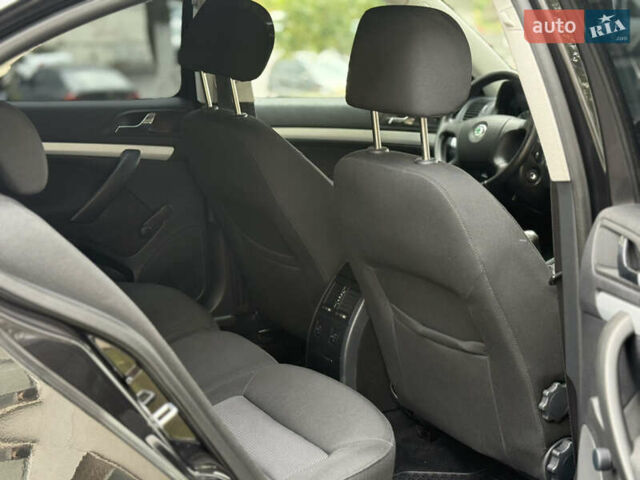 Чорний Шкода Октавія, об'ємом двигуна 1.6 л та пробігом 157 тис. км за 8599 $, фото 34 на Automoto.ua