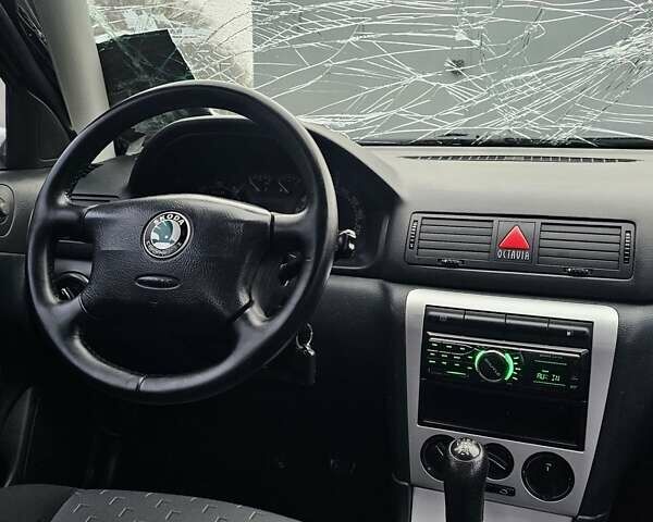 Черный Шкода Октавия, объемом двигателя 1.6 л и пробегом 210 тыс. км за 2200 $, фото 20 на Automoto.ua