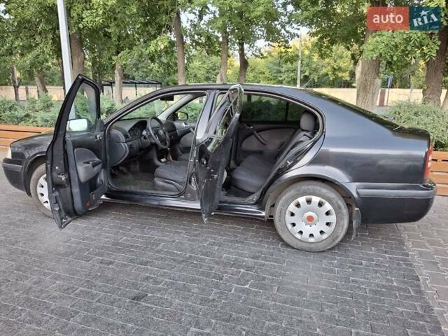 Черный Шкода Октавия, объемом двигателя 1.6 л и пробегом 258 тыс. км за 4800 $, фото 9 на Automoto.ua