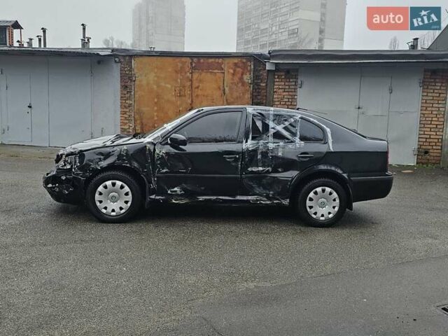 Черный Шкода Октавия, объемом двигателя 1.6 л и пробегом 210 тыс. км за 2200 $, фото 5 на Automoto.ua