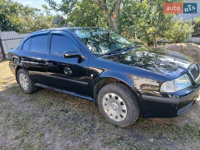 Черный Шкода Октавия, объемом двигателя 1.6 л и пробегом 183 тыс. км за 6000 $, фото 1 на Automoto.ua