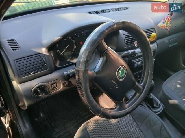 Черный Шкода Октавия, объемом двигателя 1.6 л и пробегом 183 тыс. км за 6000 $, фото 14 на Automoto.ua