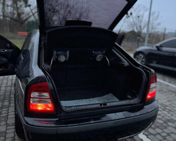 Черный Шкода Октавия, объемом двигателя 1.6 л и пробегом 245 тыс. км за 5400 $, фото 31 на Automoto.ua