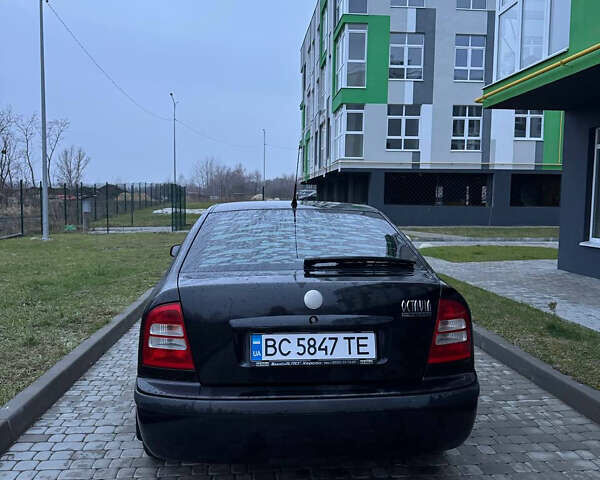 Черный Шкода Октавия, объемом двигателя 1.6 л и пробегом 245 тыс. км за 5400 $, фото 8 на Automoto.ua