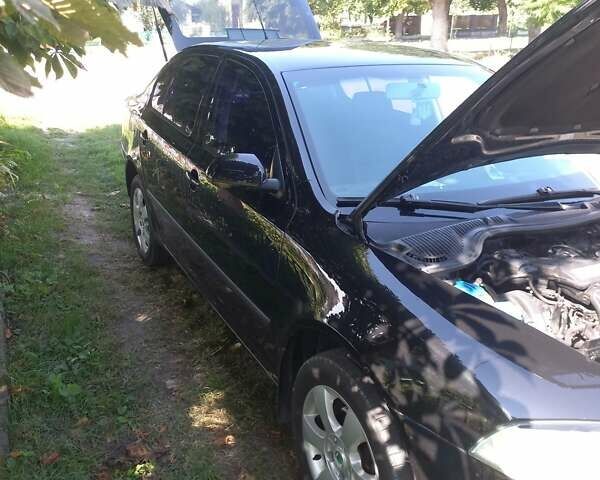 Черный Шкода Октавия, объемом двигателя 1.62 л и пробегом 210 тыс. км за 6500 $, фото 5 на Automoto.ua