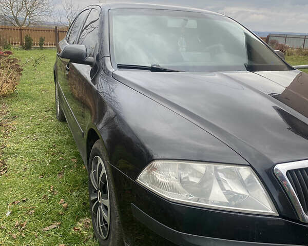 Черный Шкода Октавия, объемом двигателя 1.8 л и пробегом 346 тыс. км за 4600 $, фото 2 на Automoto.ua