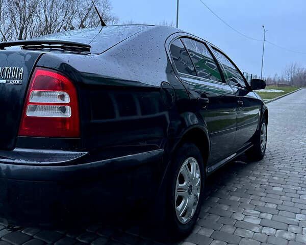 Черный Шкода Октавия, объемом двигателя 1.6 л и пробегом 245 тыс. км за 5400 $, фото 11 на Automoto.ua