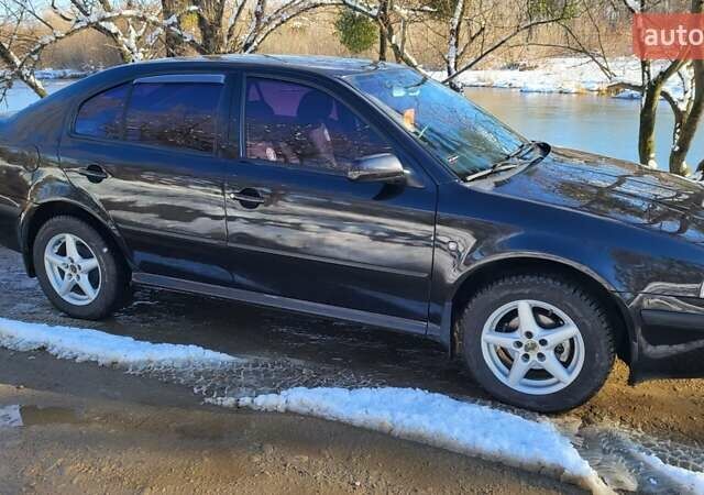 Черный Шкода Октавия, объемом двигателя 1.6 л и пробегом 230 тыс. км за 4800 $, фото 9 на Automoto.ua