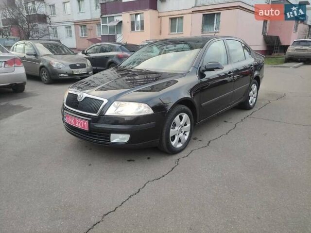 Черный Шкода Октавия, объемом двигателя 1.6 л и пробегом 198 тыс. км за 6999 $, фото 2 на Automoto.ua