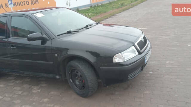 Черный Шкода Октавия, объемом двигателя 1.6 л и пробегом 250 тыс. км за 5700 $, фото 1 на Automoto.ua