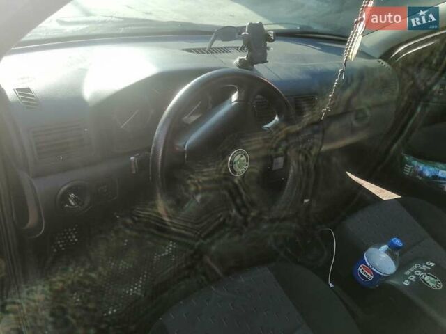 Черный Шкода Октавия, объемом двигателя 1.9 л и пробегом 243 тыс. км за 4000 $, фото 1 на Automoto.ua