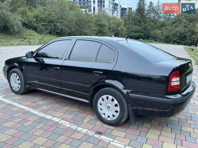 Черный Шкода Октавия, объемом двигателя 1.6 л и пробегом 225 тыс. км за 5650 $, фото 6 на Automoto.ua
