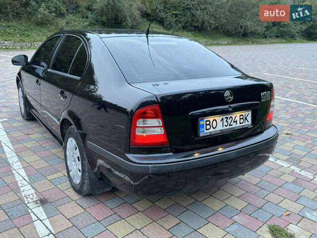 Черный Шкода Октавия, объемом двигателя 1.6 л и пробегом 225 тыс. км за 5650 $, фото 5 на Automoto.ua