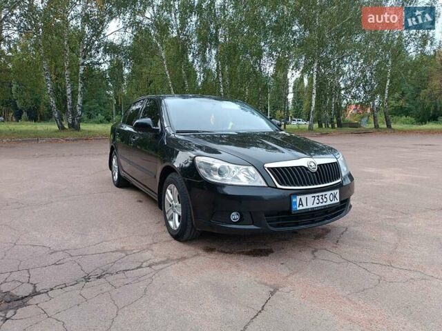 Шкода Октавия 2009 в Житомире на Automoto.ua Черный Шкода Октавия, объемом двигателя 1.6 л и пробегом 178 тыс. км за 7500 $, фото 50 на Automoto.ua
