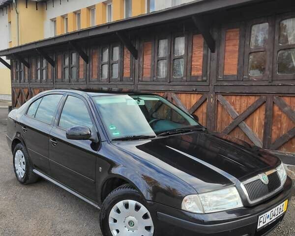 Черный Шкода Октавия, объемом двигателя 1.6 л и пробегом 197 тыс. км за 7150 $, фото 13 на Automoto.ua