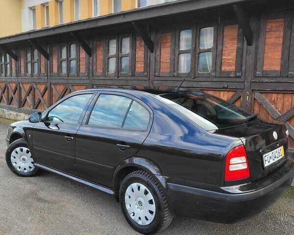 Черный Шкода Октавия, объемом двигателя 1.6 л и пробегом 197 тыс. км за 7150 $, фото 2 на Automoto.ua