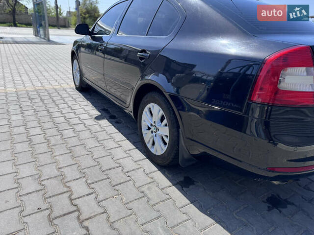 Черный Шкода Октавия, объемом двигателя 1.4 л и пробегом 206 тыс. км за 6600 $, фото 4 на Automoto.ua