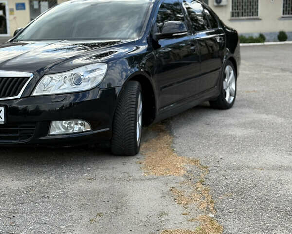 Чорний Шкода Октавія, об'ємом двигуна 1.8 л та пробігом 230 тис. км за 8900 $, фото 1 на Automoto.ua