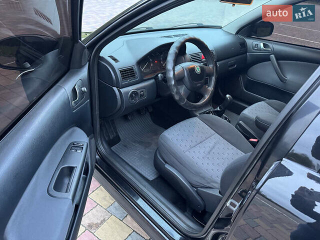 Черный Шкода Октавия, объемом двигателя 1.6 л и пробегом 225 тыс. км за 5650 $, фото 10 на Automoto.ua