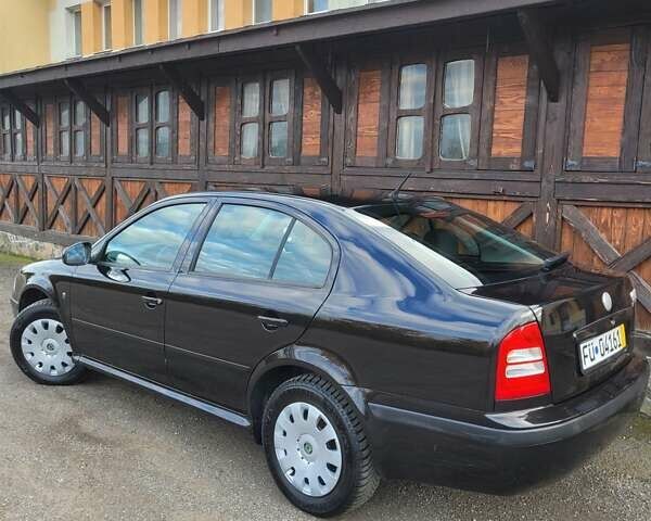 Черный Шкода Октавия, объемом двигателя 1.6 л и пробегом 197 тыс. км за 7150 $, фото 10 на Automoto.ua
