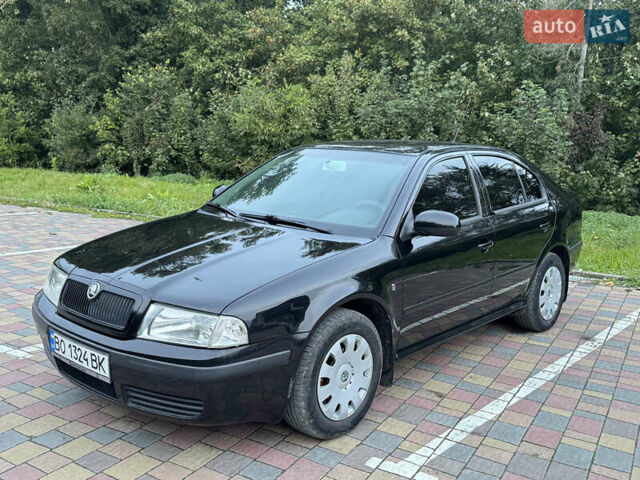 Черный Шкода Октавия, объемом двигателя 1.6 л и пробегом 225 тыс. км за 5650 $, фото 8 на Automoto.ua