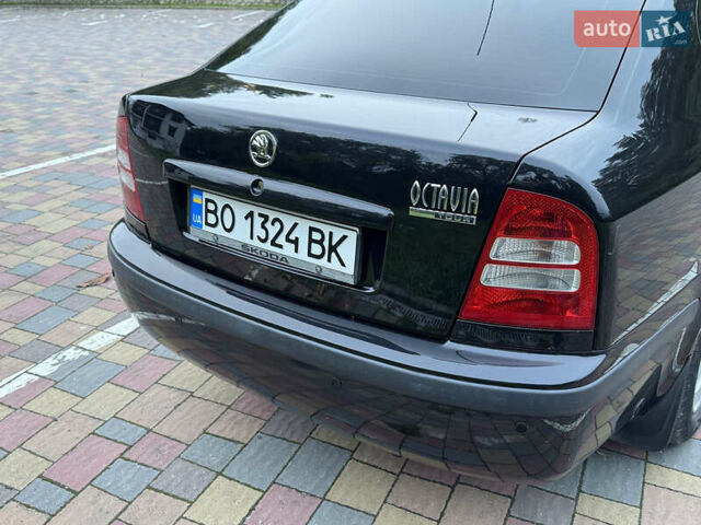 Черный Шкода Октавия, объемом двигателя 1.6 л и пробегом 225 тыс. км за 5650 $, фото 4 на Automoto.ua