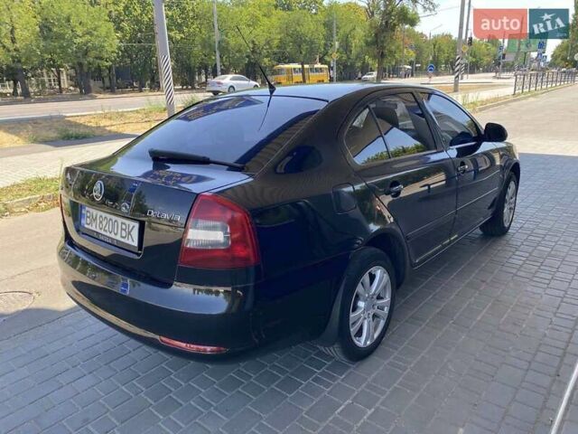 Черный Шкода Октавия, объемом двигателя 1.6 л и пробегом 173 тыс. км за 8400 $, фото 5 на Automoto.ua