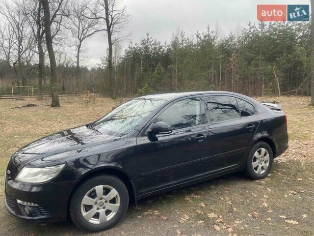 Черный Шкода Октавия, объемом двигателя 1.8 л и пробегом 220 тыс. км за 7500 $, фото 1 на Automoto.ua