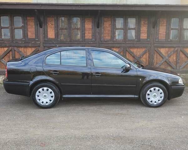 Черный Шкода Октавия, объемом двигателя 1.6 л и пробегом 197 тыс. км за 7150 $, фото 16 на Automoto.ua