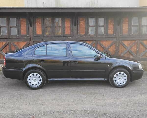 Черный Шкода Октавия, объемом двигателя 1.6 л и пробегом 197 тыс. км за 7150 $, фото 14 на Automoto.ua