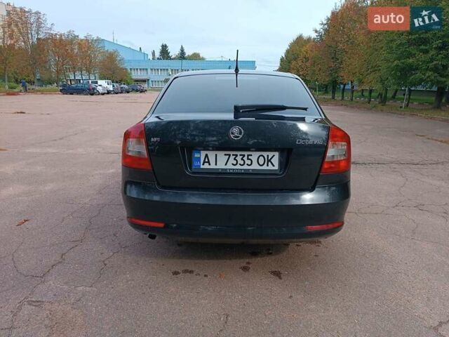 Шкода Октавия 2009 в Житомире на Automoto.ua Черный Шкода Октавия, объемом двигателя 1.6 л и пробегом 178 тыс. км за 7500 $, фото 5 на Automoto.ua