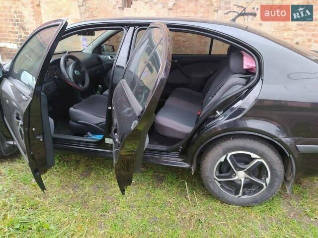 Черный Шкода Октавия, объемом двигателя 1.6 л и пробегом 196 тыс. км за 6200 $, фото 4 на Automoto.ua