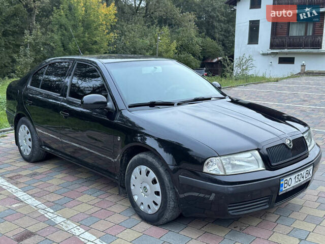 Черный Шкода Октавия, объемом двигателя 1.6 л и пробегом 225 тыс. км за 5650 $, фото 1 на Automoto.ua
