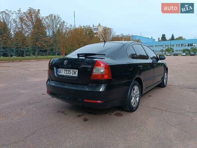 Шкода Октавия 2009 в Житомире на Automoto.ua Черный Шкода Октавия, объемом двигателя 1.6 л и пробегом 178 тыс. км за 7500 $, фото 44 на Automoto.ua