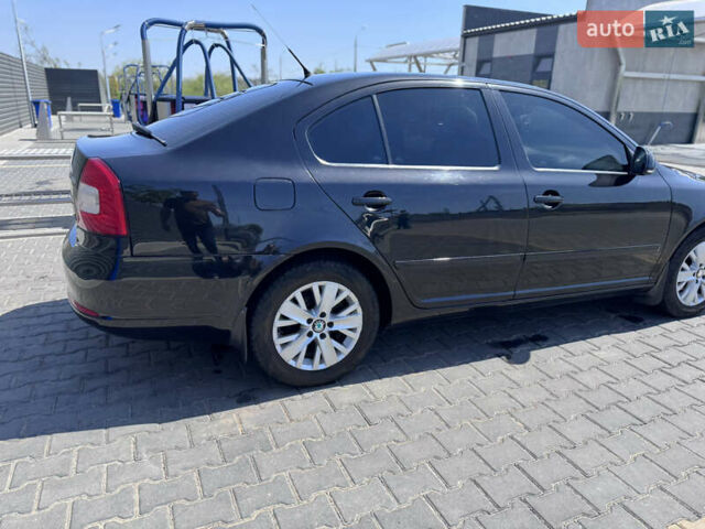 Черный Шкода Октавия, объемом двигателя 1.4 л и пробегом 206 тыс. км за 6600 $, фото 5 на Automoto.ua