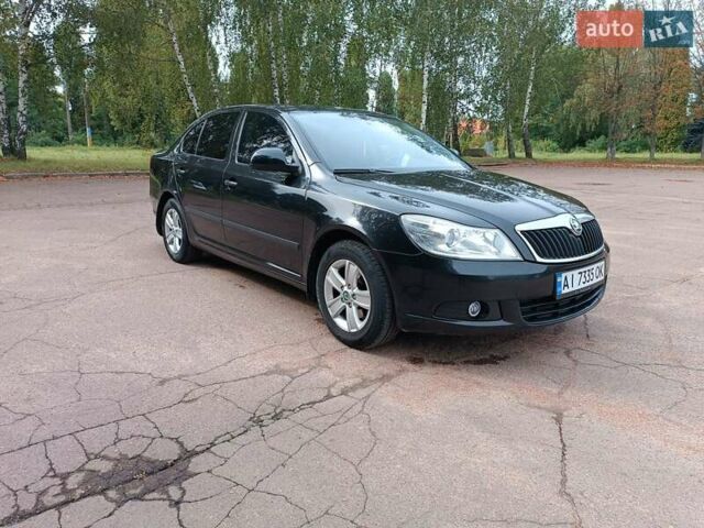 Шкода Октавия 2009 в Житомире на Automoto.ua Черный Шкода Октавия, объемом двигателя 1.6 л и пробегом 178 тыс. км за 7500 $, фото 9 на Automoto.ua